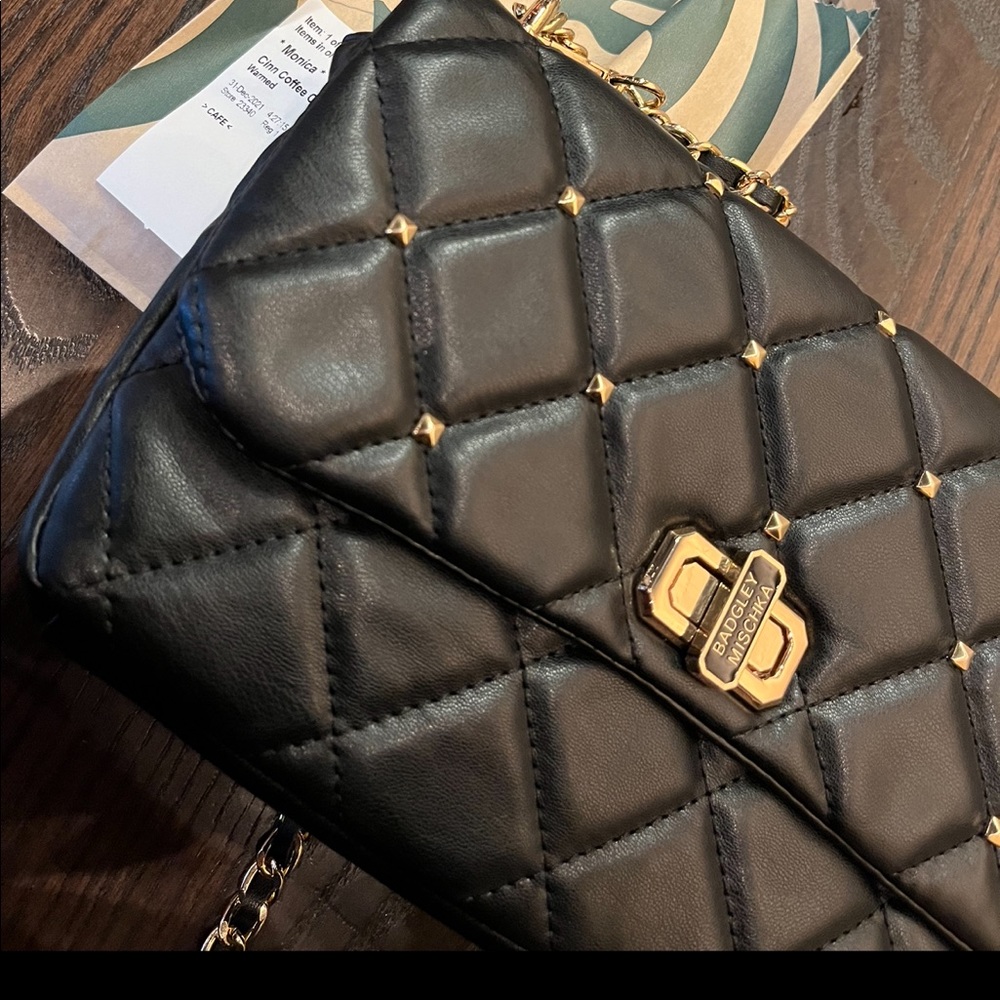 Black bag w gold chain like new make offer